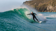 Tom Kay surfing wave