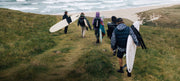 Finisterre Summer 2022 models walk with boards and new Finisterre gear